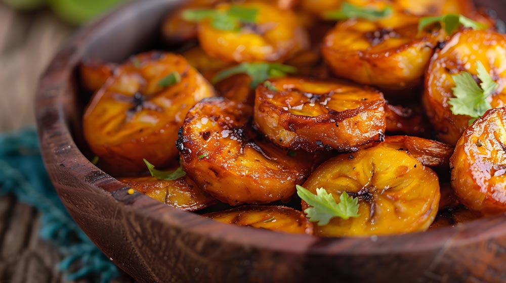 Fried plantains in a wooden bowl