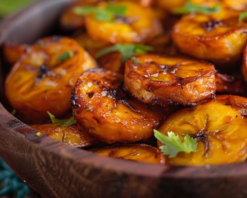Fried plantains in a wooden bowl