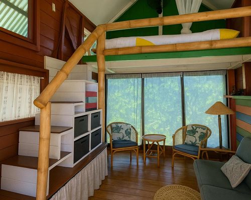 downstairs of one of the lofts with a sitting room, view of the colorful stairs